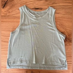 Lululemon Train to Be Tank Top
Color: Silver Blue/Silver Blue
Size: 6